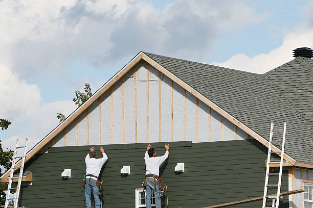 Professional Siding Repair technician working in Amherst, OH